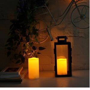 Three piece battery operated cream color candles.
